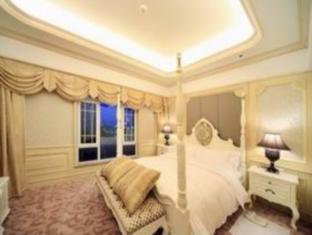 Anqinyu Club Hotel Qingdao Bagian luar foto